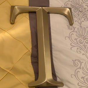 Gold, letter ‘T’ wall decor